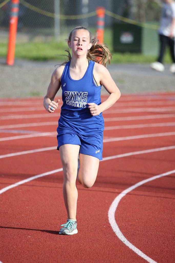 Photos: Cougars win 3-team meet / Middle school track