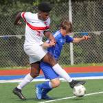 Cormac Workman, right, tangles with Christian Engmann.(Photo by Matt Simms)