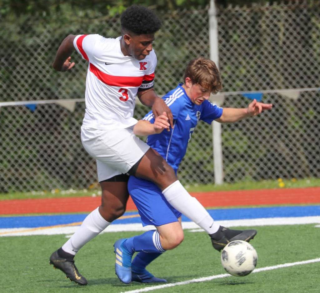Cormac Workman, right, tangles with Christian Engmann.(Photo by Matt Simms)