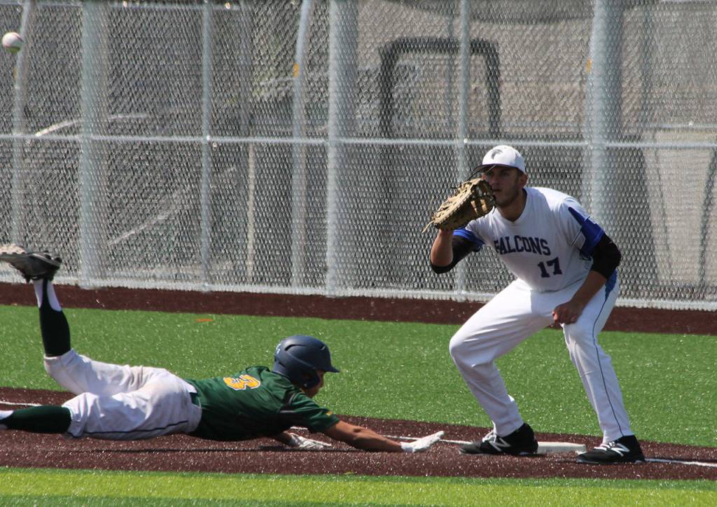 Falcon first baseman Brent Batchelor awaits the ball in a pickoff attempt.(Photo by Jim Waller/South Whidbey Record)