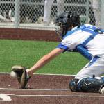 Catcher Dexter Jokinen backhands a low pitch.(Photo by Jim Waller/South Whidbey Record)