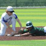 Shortstop Kody Newman tags out a wouldbe Overlake base stealer.(Photo by Jim Waller/South Whidbey Record)