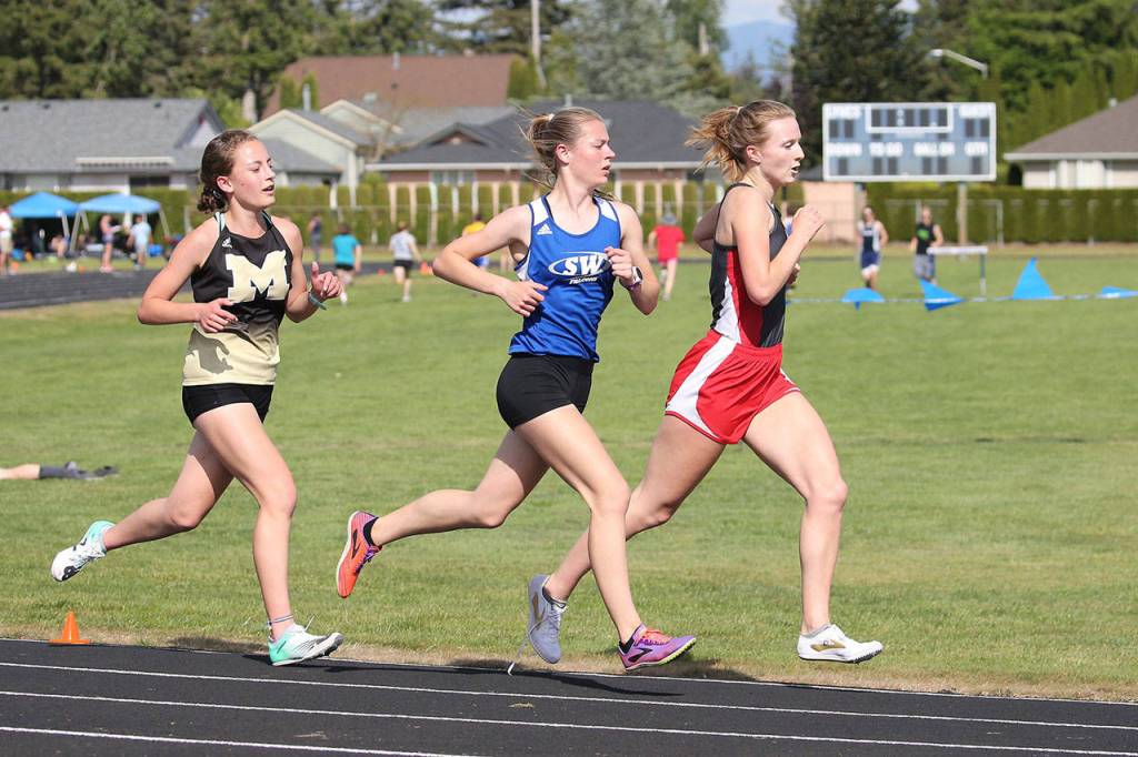 Kaia Swegler Richmond runs in the 3,200 meters.(Photo by John Fisken)