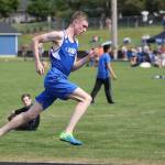 Ben Fly-Rinker runs the 200 meters for South Whidbey.(Photo by John Fisken)