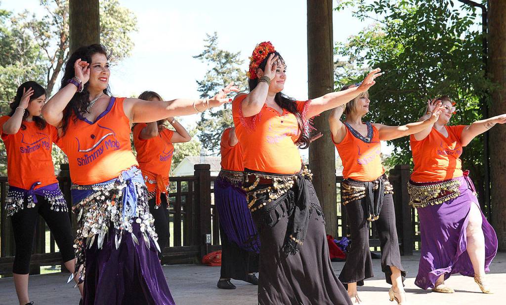(Photo by Laura Guido/Whidbey News-Times)                                From left, Chandani Teresa Ortego, Tessa May, Badeah Shirazi and Amber Groves perform a belly dance at Coupeville Town Park. The event aims to spread awareness and raise money for victims of abuse.