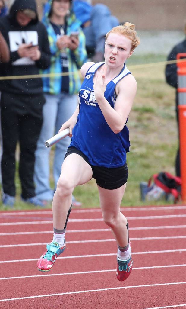 Mattason Straub carries the baton for the Falcons.(Photo by John Fisken)
