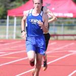 Michael Cepowski runs to seventh place in the 3,200.(Photo by John Fisken)