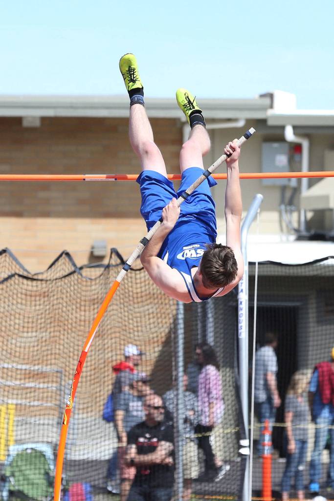 Tyler King competes in the pole vault for South Whidbey.(Photo by John Fisken)