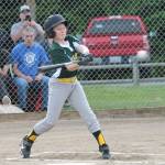 Cohan Criswell attacks a pitch in Wednesdays game.(Photo by Jim Waller/South Whidbey Record)