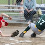 Malachi Pierson (17) slides by the tag to score a run for the South Whidbey Athletics.(Photo by Jim Waller/South Whidbey Record)