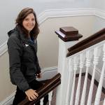 (Photo by Maria Matson/Whidbey News Group)                                Robyn Myers ascends the stairs in the Colonels House, a popular destination for visitors at the annual open house at Camp Casey.