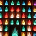 Lit-up glass statues of the goddess, Tara, shine from two corners of the sanctuary. Photo by Patricia Guthrie/Whidbey News Group