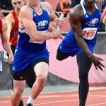 Bodie Hezel eyes the lane line after receiving the baton from Carl Henri Chapman.(Photo by Karen Swegler)