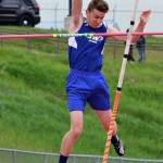 Sam Martin clears the bar in the pole vault.(Photo by Karen Swegler)