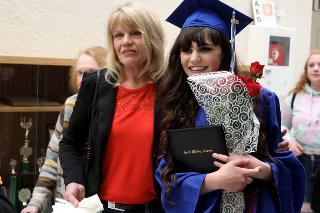 South Whidbey Academy graduate Hailey Bunn poses with her grandmother, Phyllis Nielsen, following Fridays commencement. Photo by Patricia Guthrie/Whidbey News Group