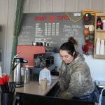 Barista Maddy Triplett prepares a drink at Crabby Coffee, which opened its second location two weeks ago in front of Island Senior Resources Thrift Store. Photo by Patricia Guthrie/Whidbey News Group