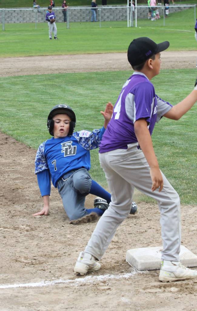 Kowen Whites advances to third base.(Photo by Jim Waller/South Whidbey Record)
