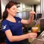 Hannah Gibbons pours a beer at Penn Cove Brewing Companys new taproom in Oak Harbor. Photo by Laura Guido/Whidbey News-Times