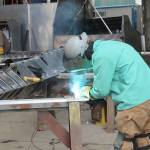 Photos by Jessie Stensland / South Whidbey Record                                A welder does work on a high-speed passenger ferry that Nichols Brothers is building for Kitsap Transit.