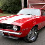 Ray Harding stands with 1969 Chevrolet Camaro Z/28, which will appear in the car show Sunday. (Photos by Laura Guido/South Whidbey Record)