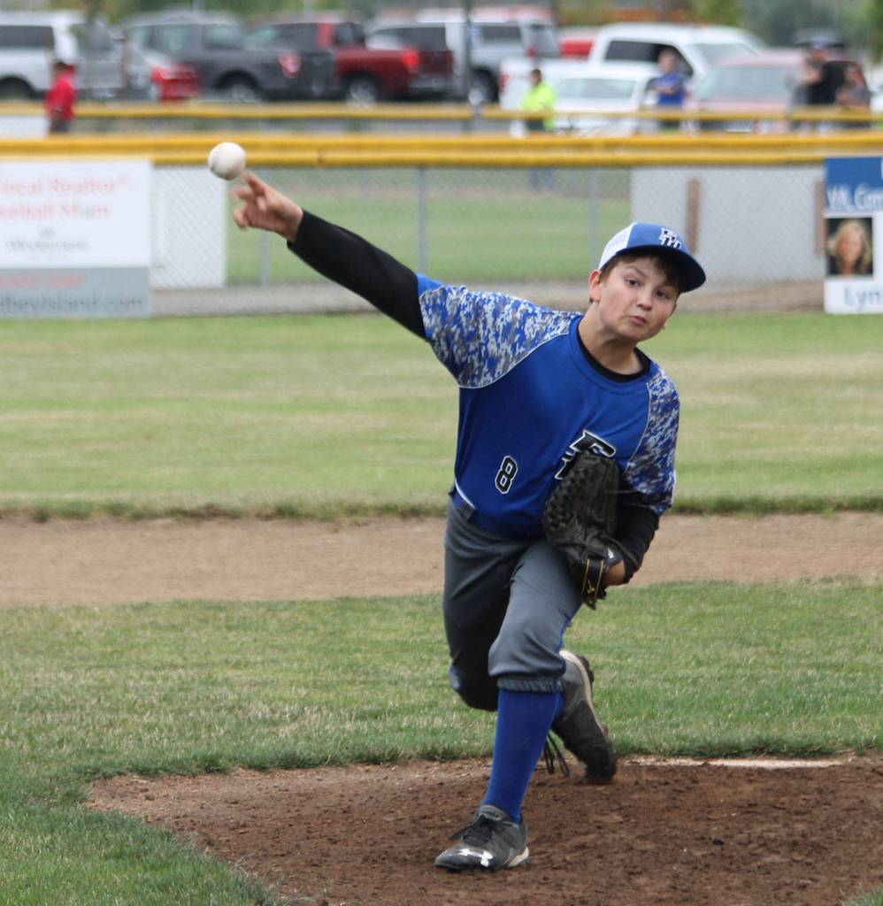 Kasen Parsell fires a pitch in the win over North Whidbey.(Photo by Jim Waller/South Whidbey Record)