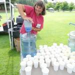 The South Whidbey Parks and Recreation District is seeking volunteers to help out with this years triathlon. Above, Susan Hamilton lends a hand at a past triathlon. (Submitted photo)