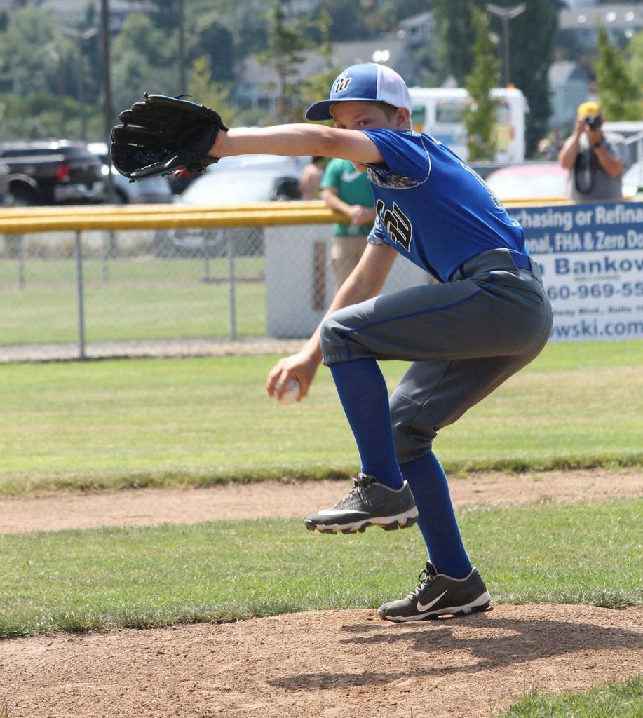 Connor Bartel peers in as he gets ready to deliver a pitch.(Photo by Jim Waller/South Whidbey Record)