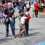 Photo by Laura Guido/Whidbey News-Times                                Landon Hagen, 3, competes to pop a bubble first at the Whidbey Island Fair Thursday.