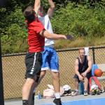 Brady Hezel of the Falcons shoots over the defense of Gavin OKeefe of Trust the Process. (Photo by Jim Waller/South Whidbey Record)