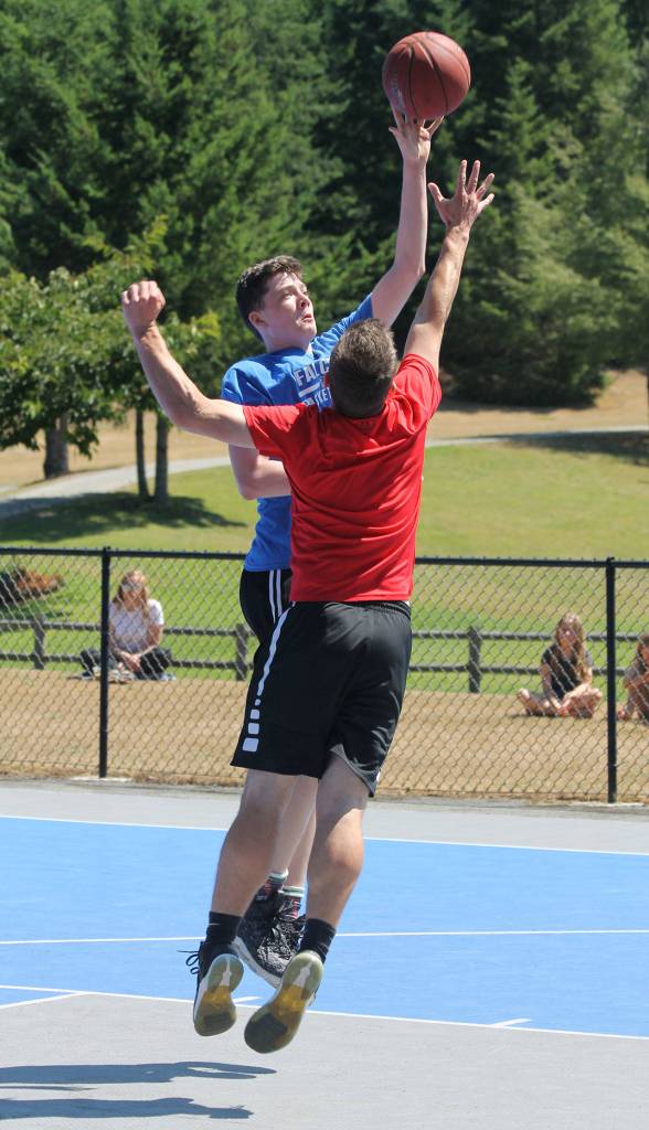 Sterling Patton shoots a floater in the Falcons opening round win over Trust the Process. (Photo by Jim Waller/South Whidbey Record)