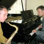 Well-known Whidbey saxophonist Neil Welch practices with pianist Rich Pellegrin at the United Methodist Church hall in Langley.