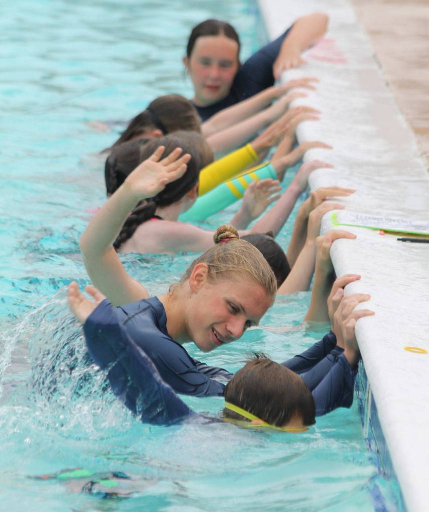 Instructor Sam Baelser, second from bottom, helps a youngster during Thursdays lessons. (Photo by Jim Waller/South Whidbey Record)