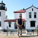 Wayne Clark recently received the Volunteer of the Year award from Washington State Parks for his time and dedication to the lighthouse at Fort Casey State Park. (Photo by Laura Guido/Whidbey News-Times)