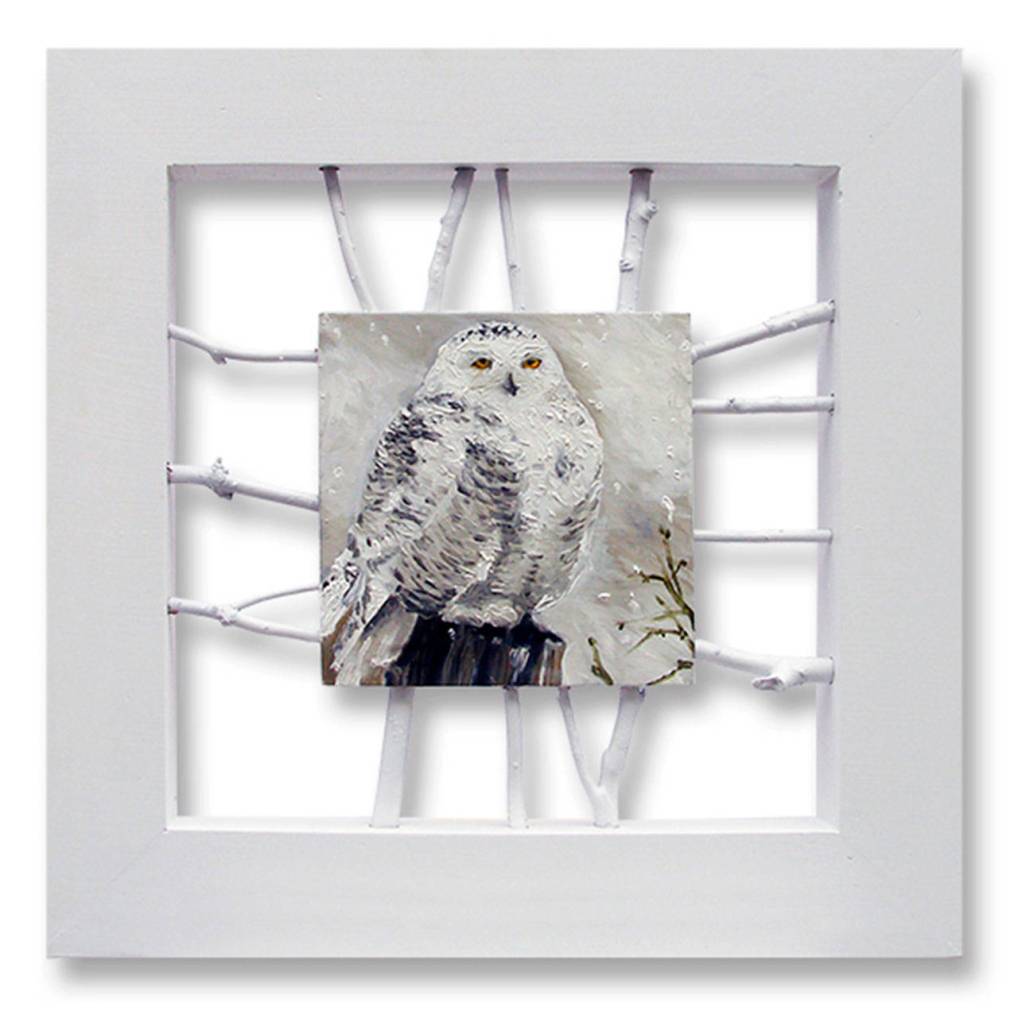 Artist Doug Hansen captures the beauty of a Snowy Owl. Photo provided by Whidbey Art Gallery