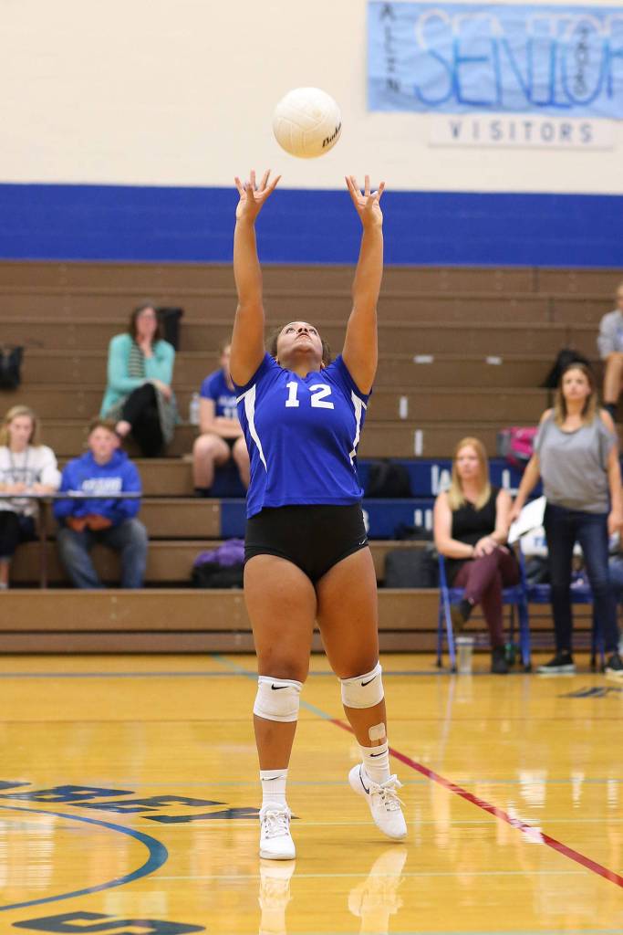 Maya Tschetter sets up the South Whidbey attack.(Photo by John Fisken)