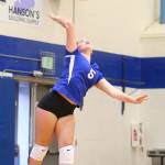Kamryn Wilson powers a serve for the Falcons.(Photo by John Fisken)