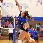 Kamryn Wilson uses a tip to attack for South Whidbey.(Photo by John Fisken)