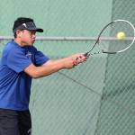 South Whidbeys Jordan Wu slaps a handhand in his third doubles win at Coupeville Wednesday. (Photo by John Fisken)