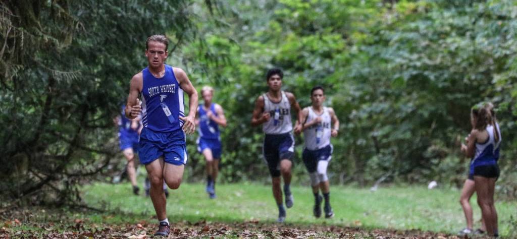 Michael Harwell runs to a third-place finish in the meet.(Photo by Matt Simms)