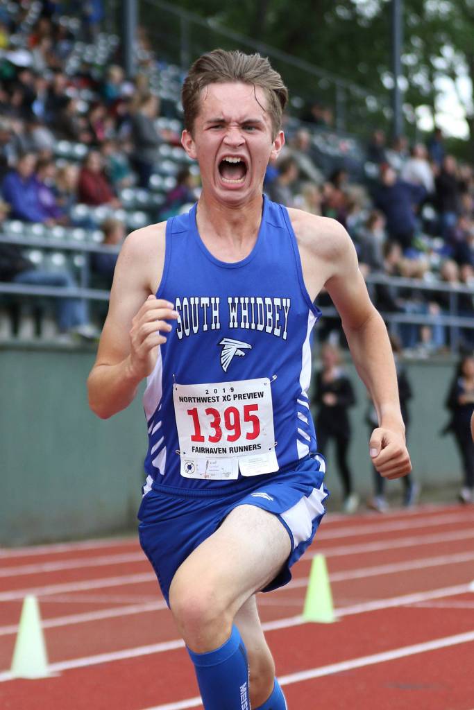 Preston Leon gives his all as he trims 80 seconds off his previous best time.(Photo by John Fisken)