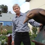 Photo by Wendy Leigh/South Whidbey Record                                Rob Schouten welcomes one of the newest sculptures to the sculpture garden at Rob Schouten Gallery in Langley.