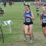Natalie Rodriguez, left, Flannery Friedman and Laila Gmerek begin the second loop of the course.(Photo by Jim Waller/South Whidbey Record)