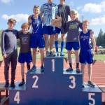 The South Whidbey High School boys cross country team receives its first-place award Saturday. From the left are Aidan OBrien, Aidan Donnelly, Cooper Ullmann, Michael Harwell, Preston Leon, Thomas Simms and Reilly McVay. (Photo by Matt Simms)