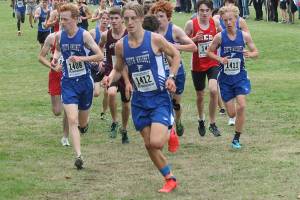 High school boys, middle school girls claim team titles / Cross country