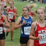 Falcons Grace Huffman (1391) and Jasmin Graner, right, complete the first lap of the course.(Photo by Jim Waller/South Whidbey Record)