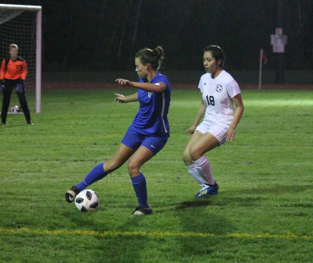 Alison Papritz controls the ball in front of Sultans Heidi Millan.(Photo by Jim Waller/South Whidbey Record)