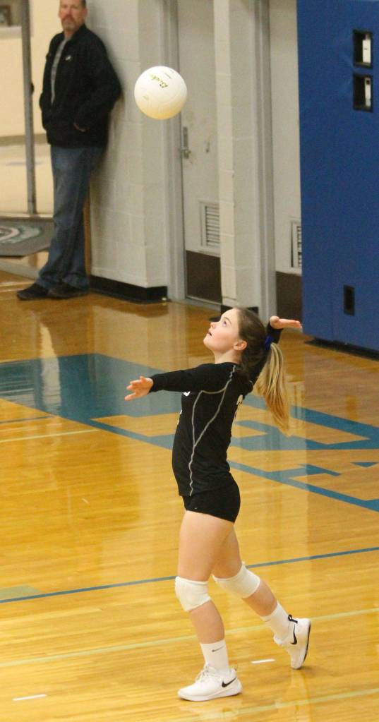 Joanie Welever serves for the Falcons.(Photo by Jim Waller/South Whidbey Record)