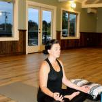 Alisha Walsh from Meaningful Movement Dance & Yoga meditates in her class space at Soundview Center. Photo by Wendy Leigh/South Whidbey Record