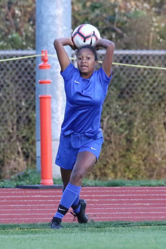Lenience Gonzales puts the ball in play.(Photo by John Fisken)