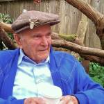 Leo Baldwin, namesake of the new Leos Place community dining space in Bayview, wears one of his iconic decorated hats at The Commons in Langley. Photo by Becky Dougherty, courtesy of Christine Baldwin